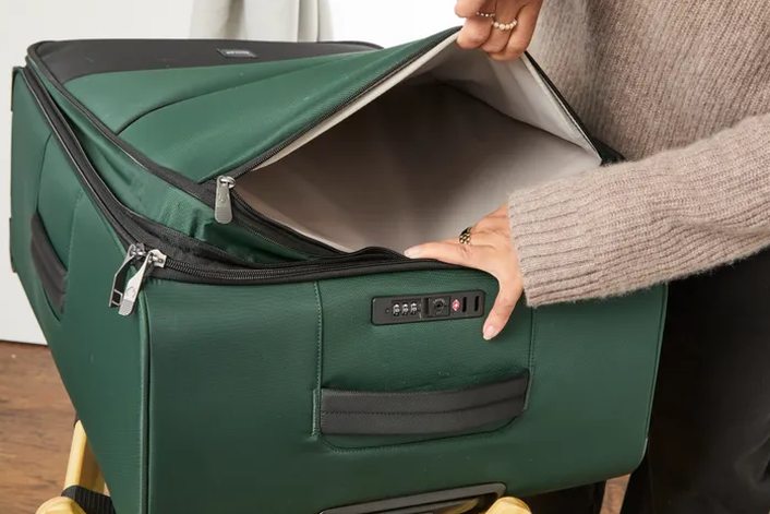 Level8 Grace Carry-On front laptop pocket, unzipped, showing interior space tradeoff