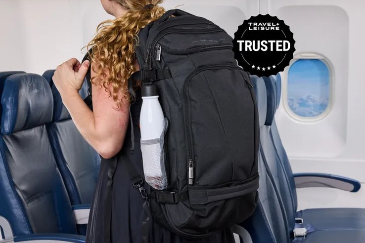 Level8 carry-on and American Tourister carry-on side by side, wheels facing camera